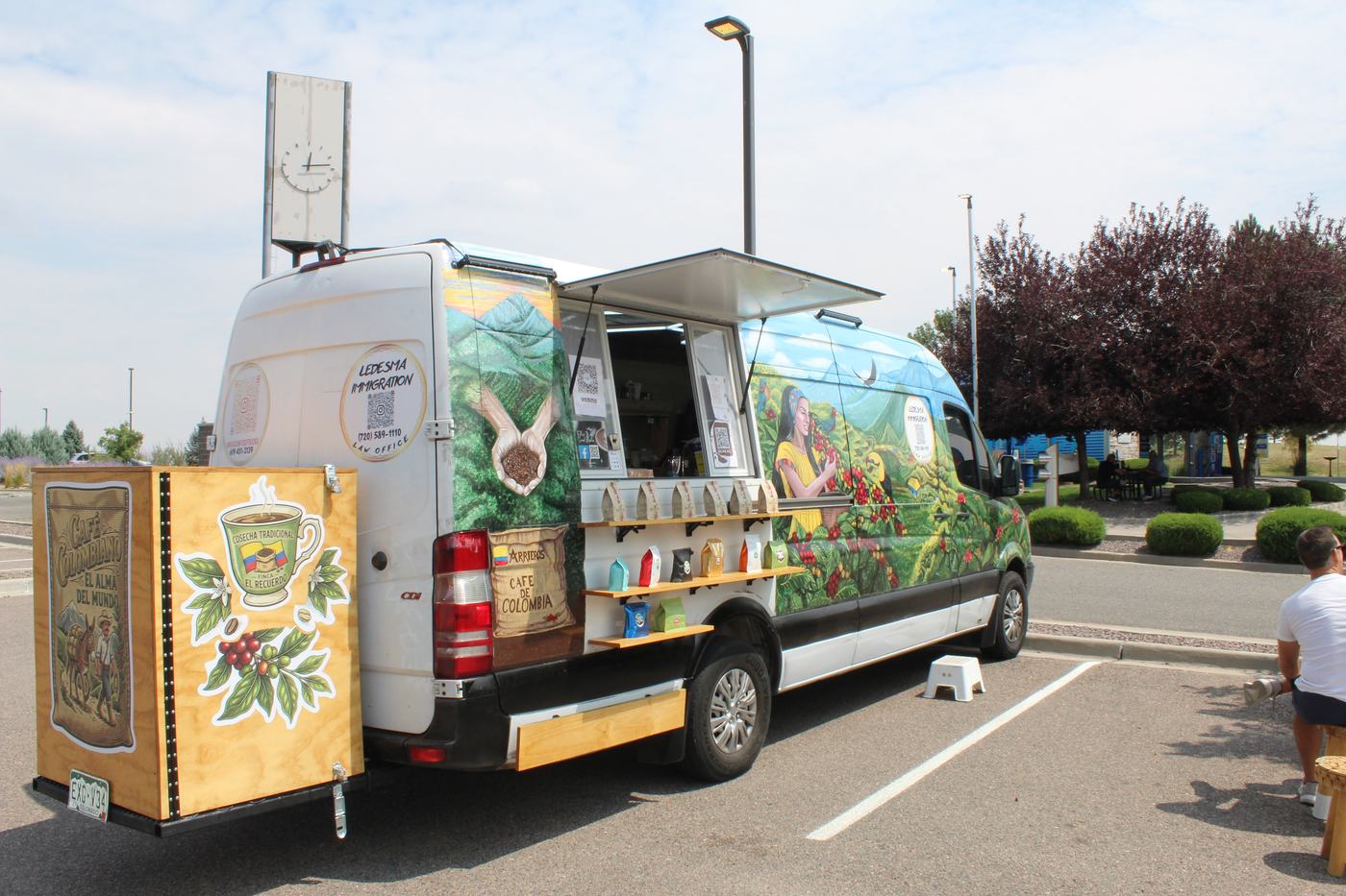 The Caf&eacute; Arrieros van with its service window open in the Revel parking lot