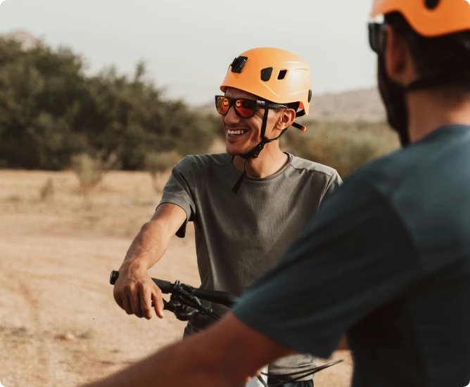 Two riders out on the trail at the end of a ride