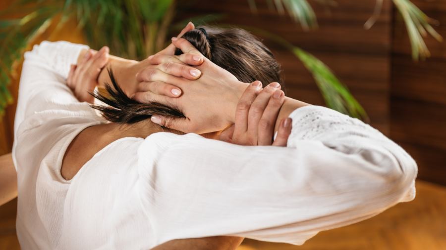 An assisted shoulder and neck release during an Advanced Therapeutic Relief session